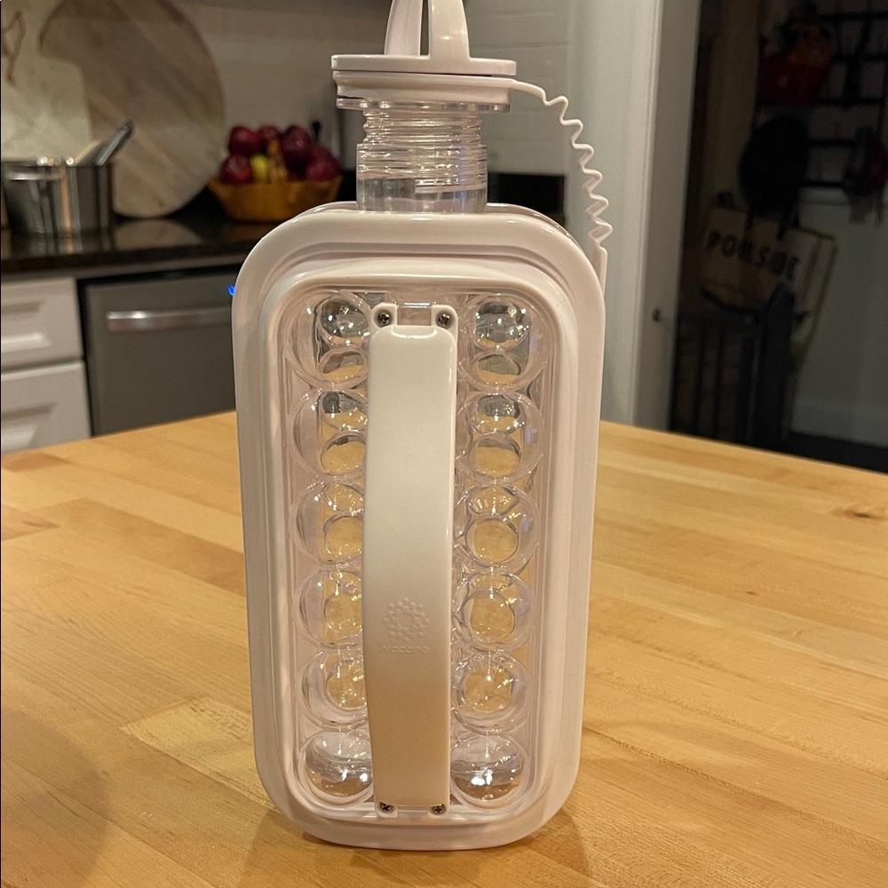 White and Clear Round Ice Cube Maker/Water Bottle with Handle
